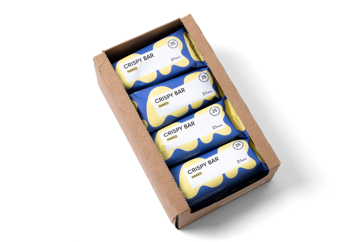 Box geöffnet: Geöffnete LIKA CRISPY BAR Naked Box mit Blick auf vier verpackte Riegel