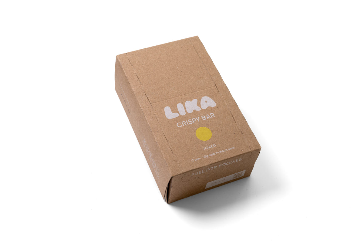 Kraftpapier-Verpackung außen: LIKA CRISPY BAR Naked Box mit 12 Riegeln, Aufschrift Fuel for Foodies
